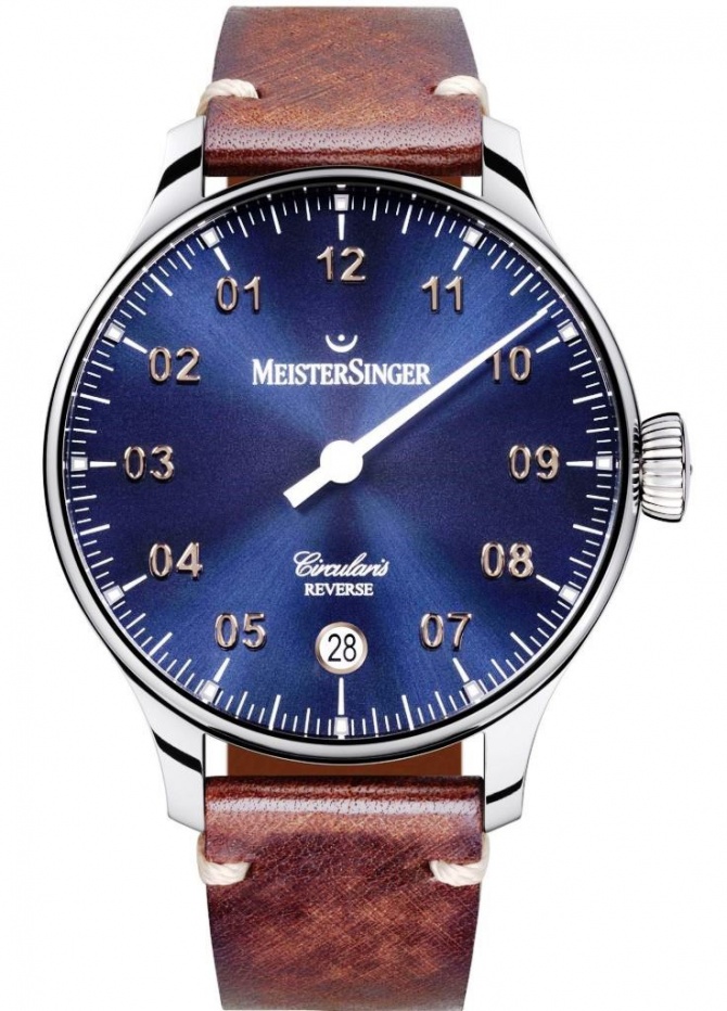 MeisterSinger Circularis Reverse – вот символ успешного трейдера. Часы, недавно презентованные в Дубаях на местной часовой выставке, носящей при этом статус международной, Dubai Watch Week. Смотри какая прелесть.
Есть, правда, один нюанс – часы MeisterSinger Circularis Reverse идут в обратную сторону! Что сделано с учетом специфики написания арабского языка. Но, не спеши расстраиваться и подумай о том, что такие часы сами по себе уникальны и могут подчеркнуть твою оригинальность, а также, дать знак, что вы имеете некоторое отношение к арабским шейхам. Оно того стоит.